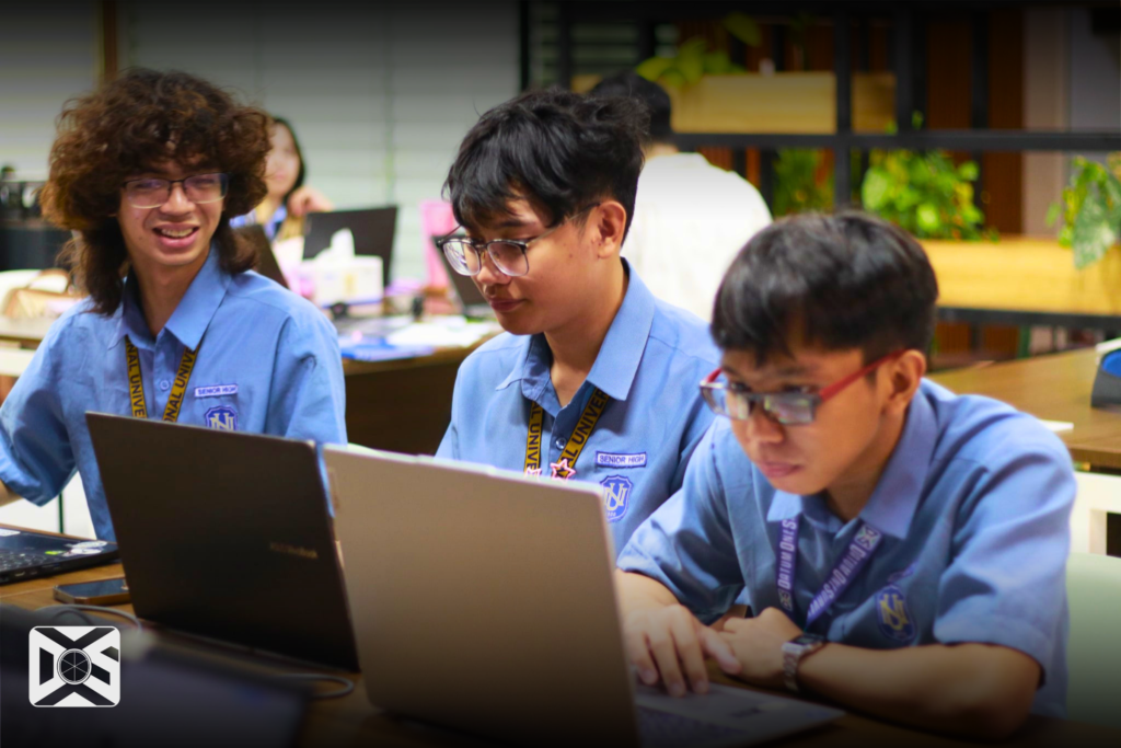 NU Fairview Students learning how to plot land parcels on their laptops